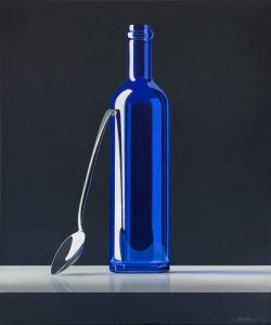 Composition with blue bottle and spoon
